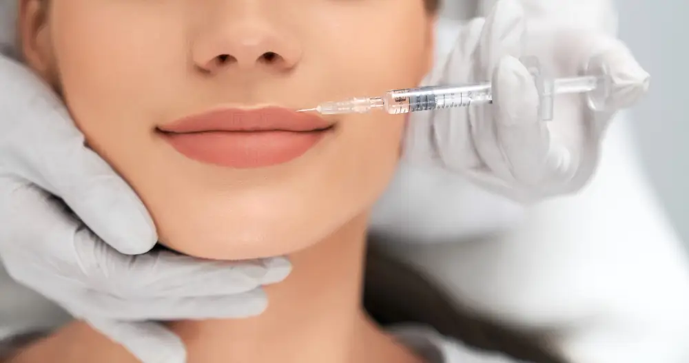 Close-up of a lip filler injection